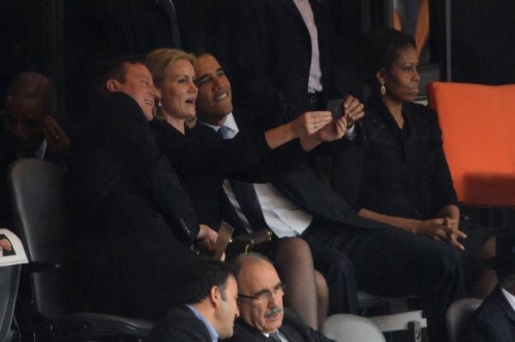 President Obama, David Cameron, and Helle Thorning-Schmidt pose for a selfie.